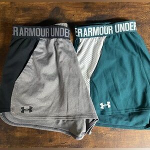 women’s UA shorts with pockets